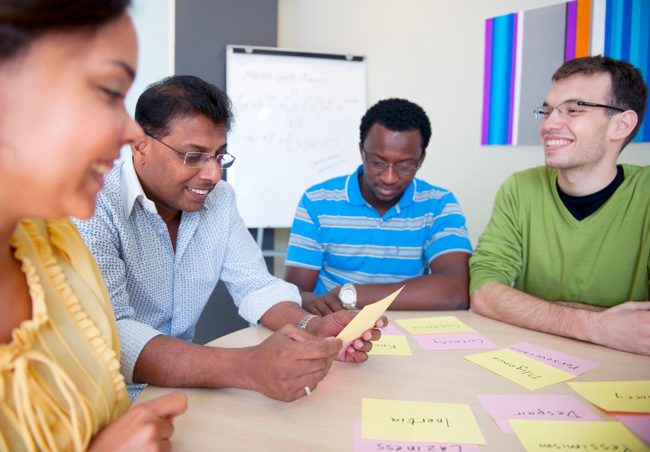 Project planning materials arranged for workshop discussion